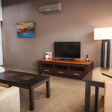 The Henry Jones Art Hotel Гобарт Екстер'єр фото A living room in a typical apartment at the Village at Grand Traverse Commons